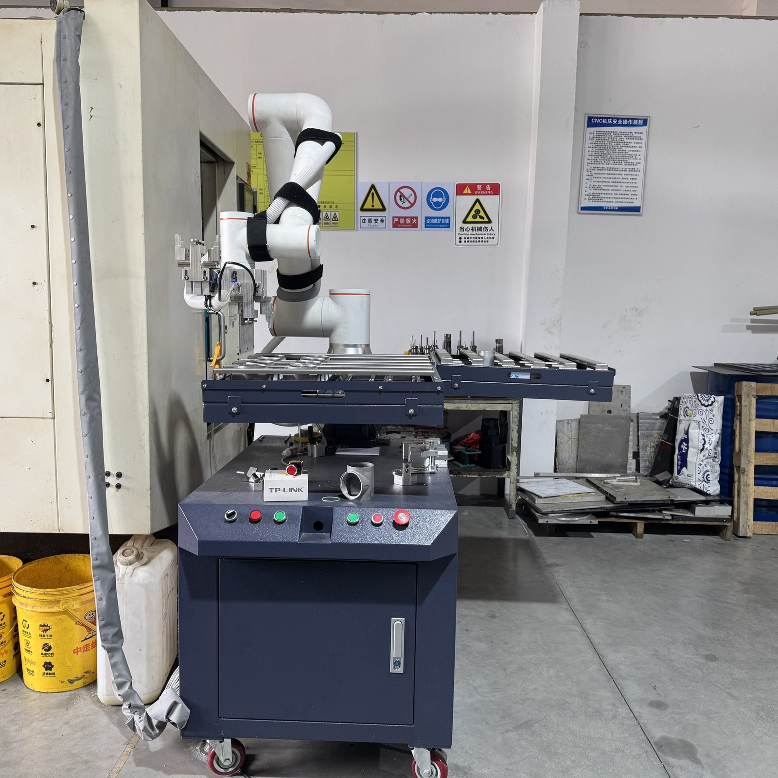 Side view of the machine tending robot and loading table